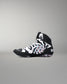 A high-top athleticwrestling shoe in black, white, and gray with a colorful abstract graphic on the side, shown against a neutral gray background.
