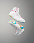 White wrestling shoes with colorful soles on a gray background