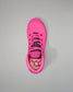 Pink athletic shoe with black laces on a gray background