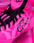 Close-up of a wrestling shoe in bright pink and magenta with black laces and a black geometric logo on the side.
