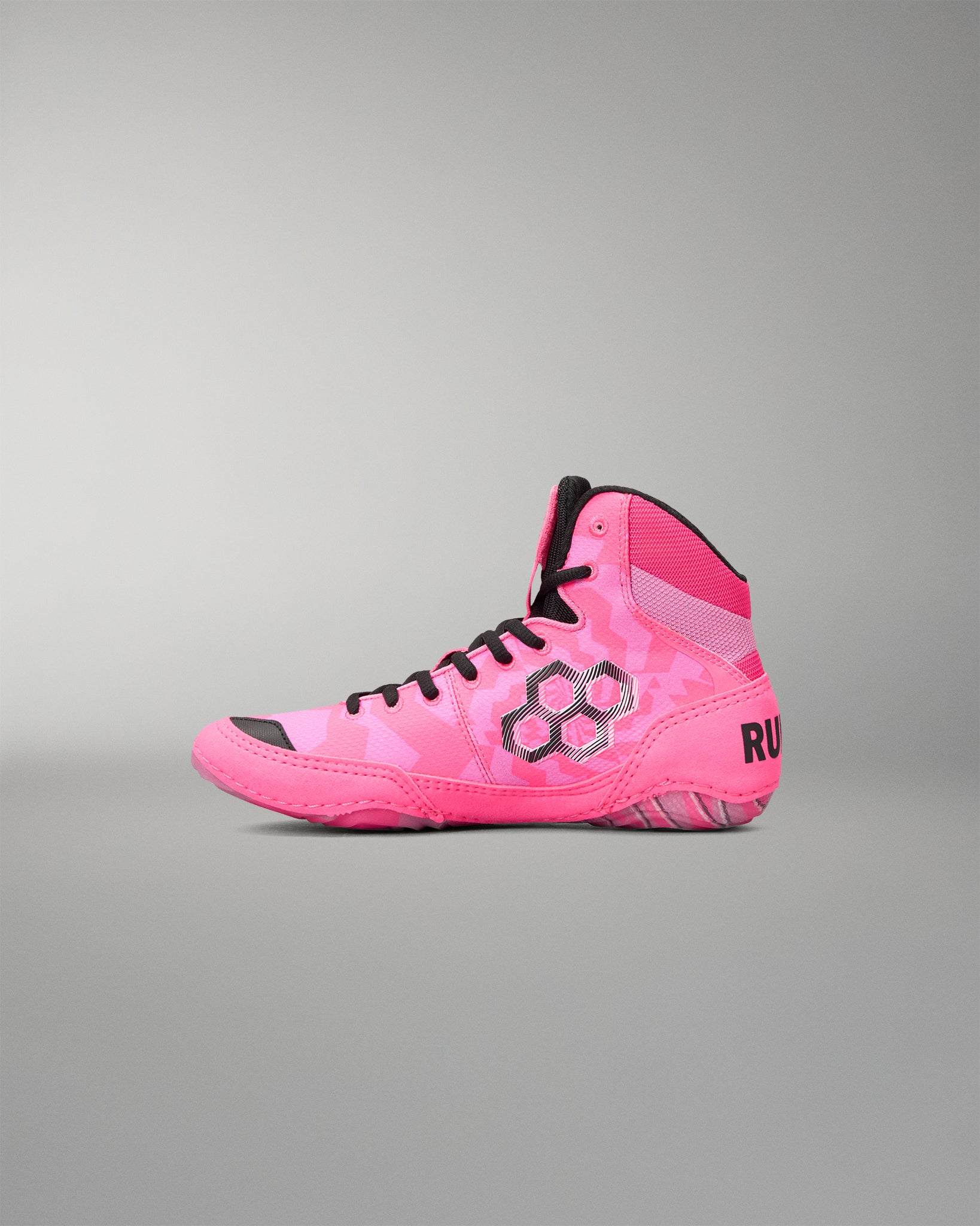 A high-top Wrestling shoe in vibrant pink with a subtle tonal camouflage pattern, black laces, and black accents, shown in profile against a neutral gray background.