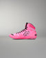 A high-top Wrestling shoe in vibrant pink with a subtle tonal camouflage pattern, black laces, and black accents, shown in profile against a neutral gray background.