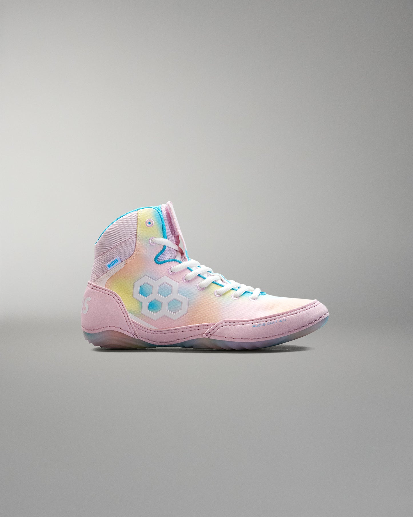 Pink Wrestling shoe with colorful accents on a gray background