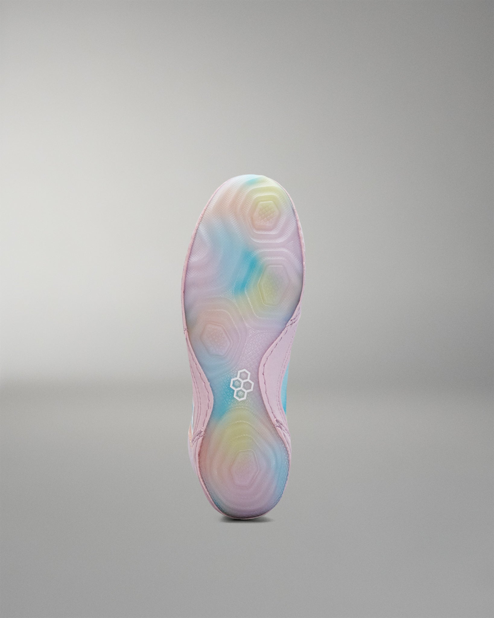 Colorful Wrestling shoe sole with a brand logo on a gray background