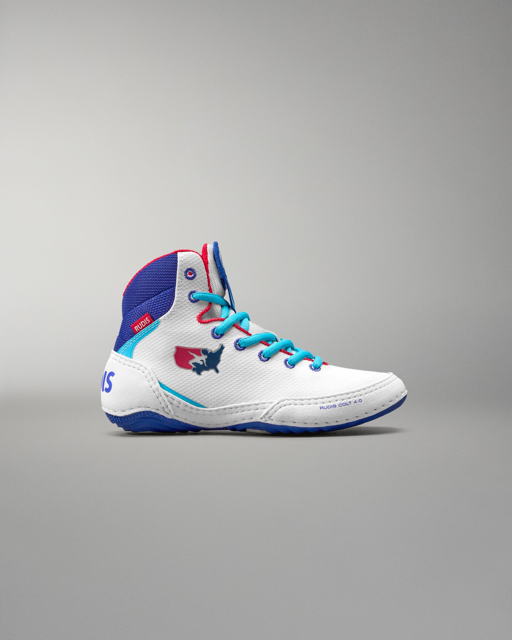 White USA Wrestling Shoes with blue and red accents on a gray background