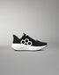 Black and white sneaker with a geometric design on a gray background