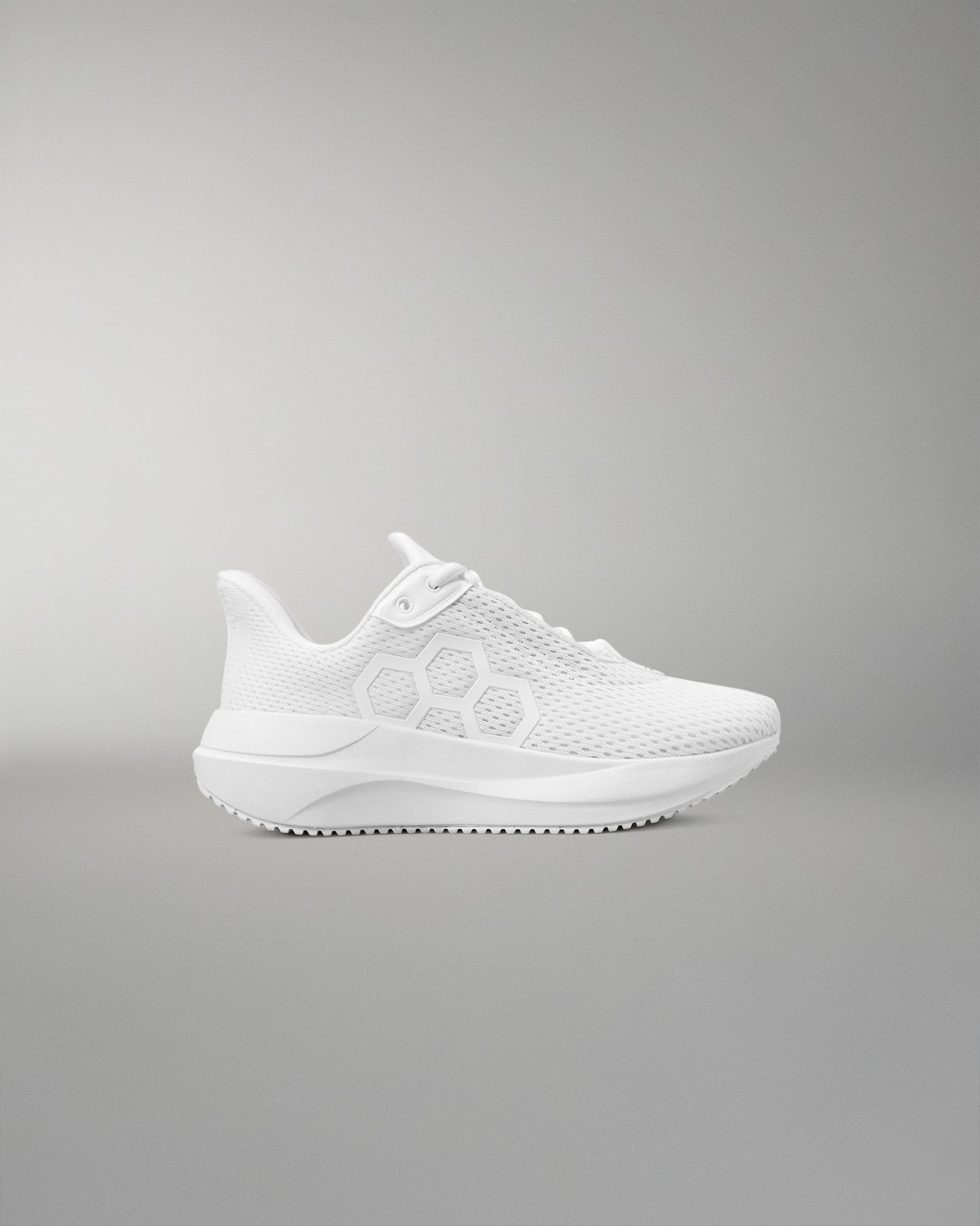 White sneaker on a gray background