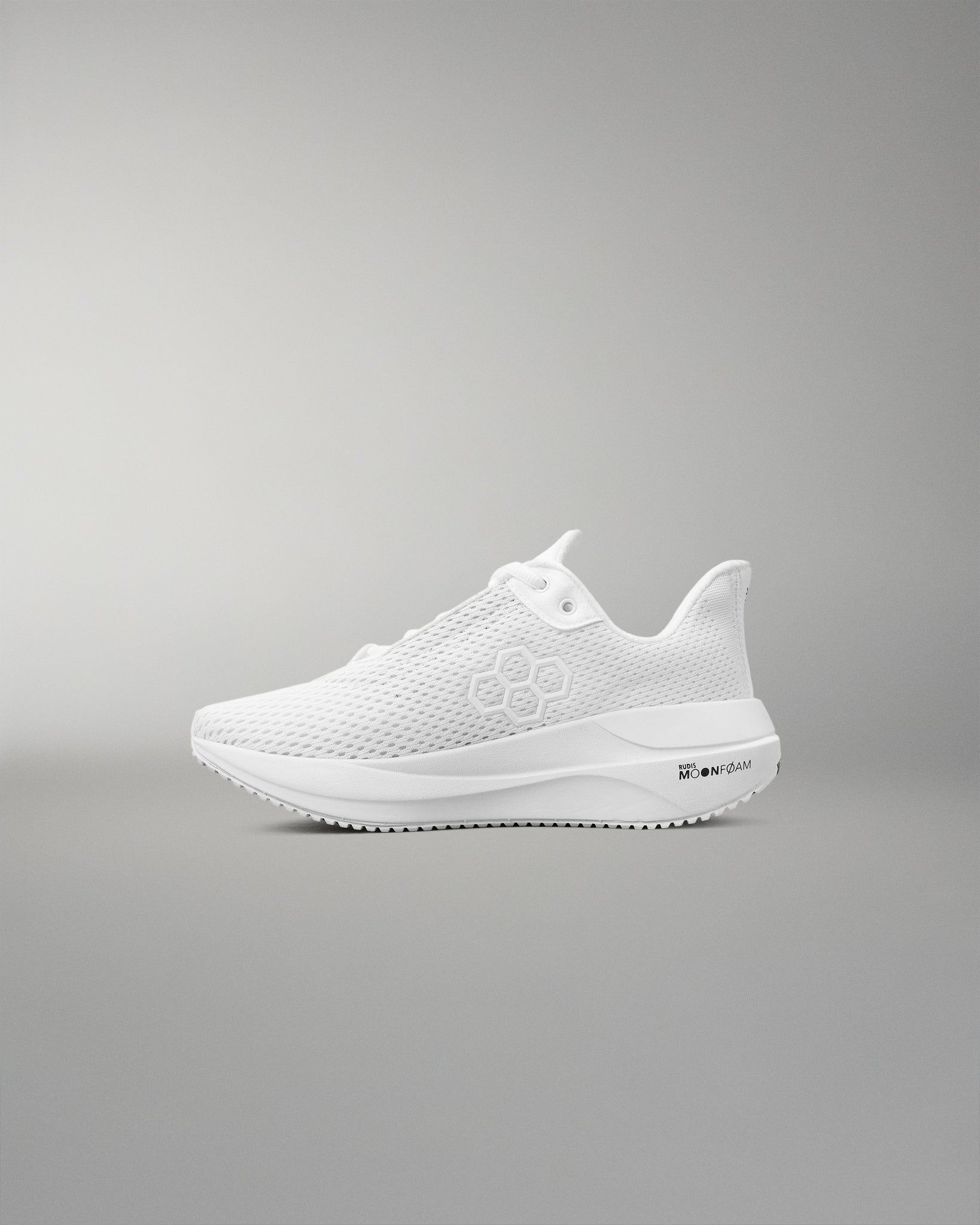 White sneaker on a gray background