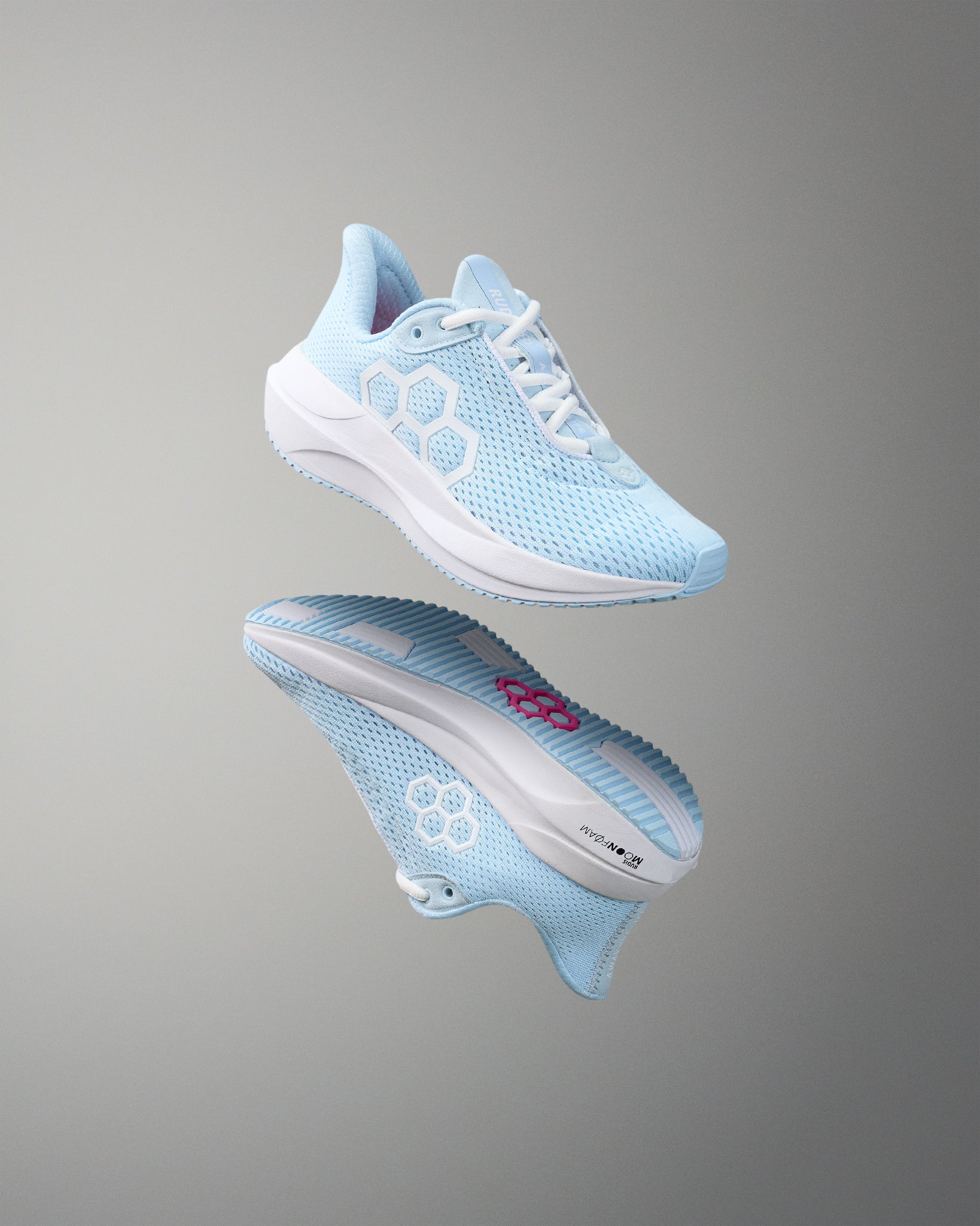 Light blue running shoe with white sole on a gray background