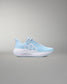 Light blue sneaker with white sole on a gray background