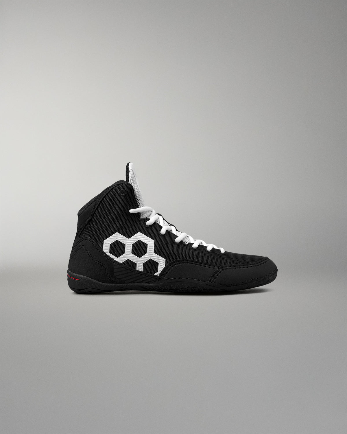 Side profile of the RUDIS Courage 2.0 Youth Wrestling Shoe with a lightweight black upper, white RUDIS logo, and supportive high-top construction.