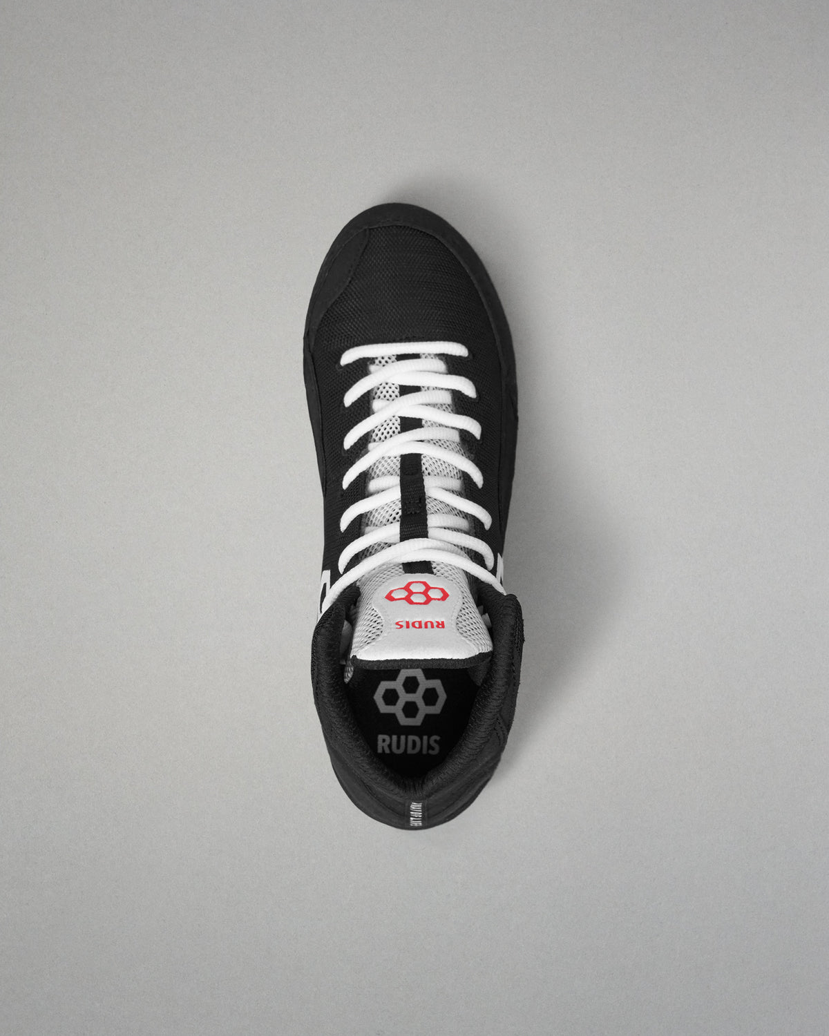 Top-down view of the RUDIS Courage 2.0 Youth Wrestling Shoe highlighting the white lace system, breathable tongue, and padded interior.