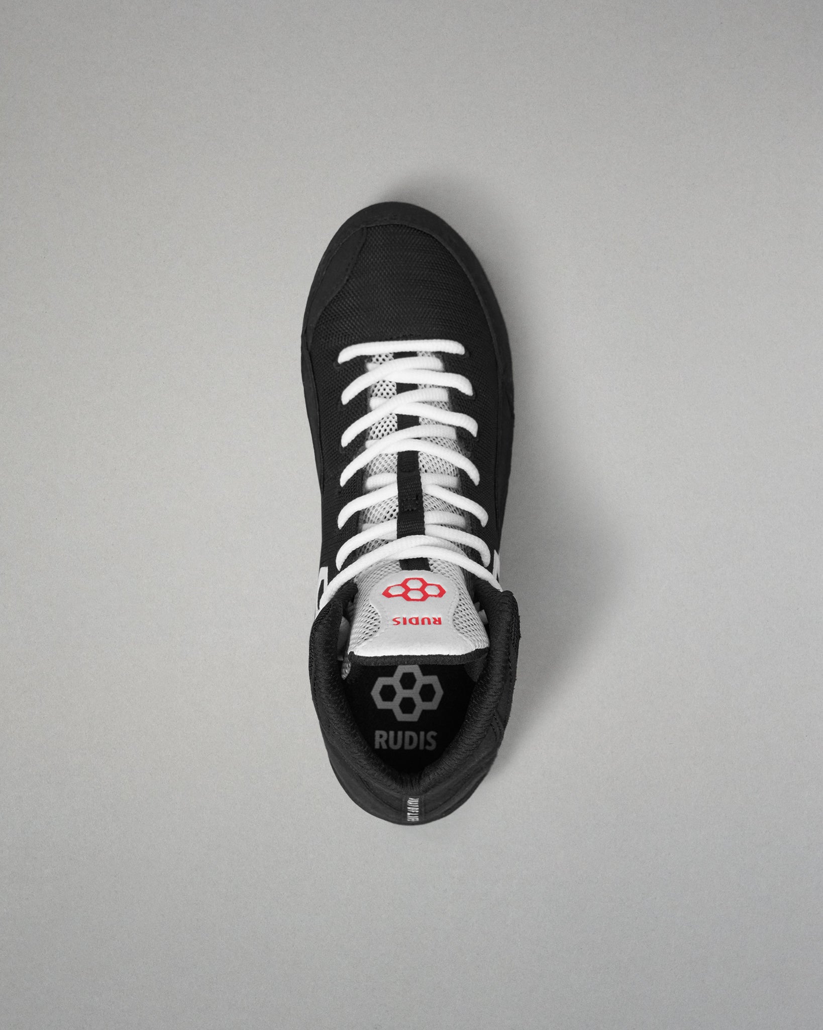 Top-down view of the RUDIS Courage 2.0 Youth Wrestling Shoe highlighting the white lace system, breathable tongue, and padded interior.