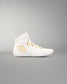 A white high-top athletic wrestling shoe with gold accents, including a gold honeycomb logo on the side and gold embroidered details on the laces, shown against a neutral gray background.