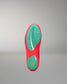 Bottom view of the RUDIS Hildebrandt 2.0 Girls Wrestling Shoe showing the teal split outsole and multidirectional traction pattern.