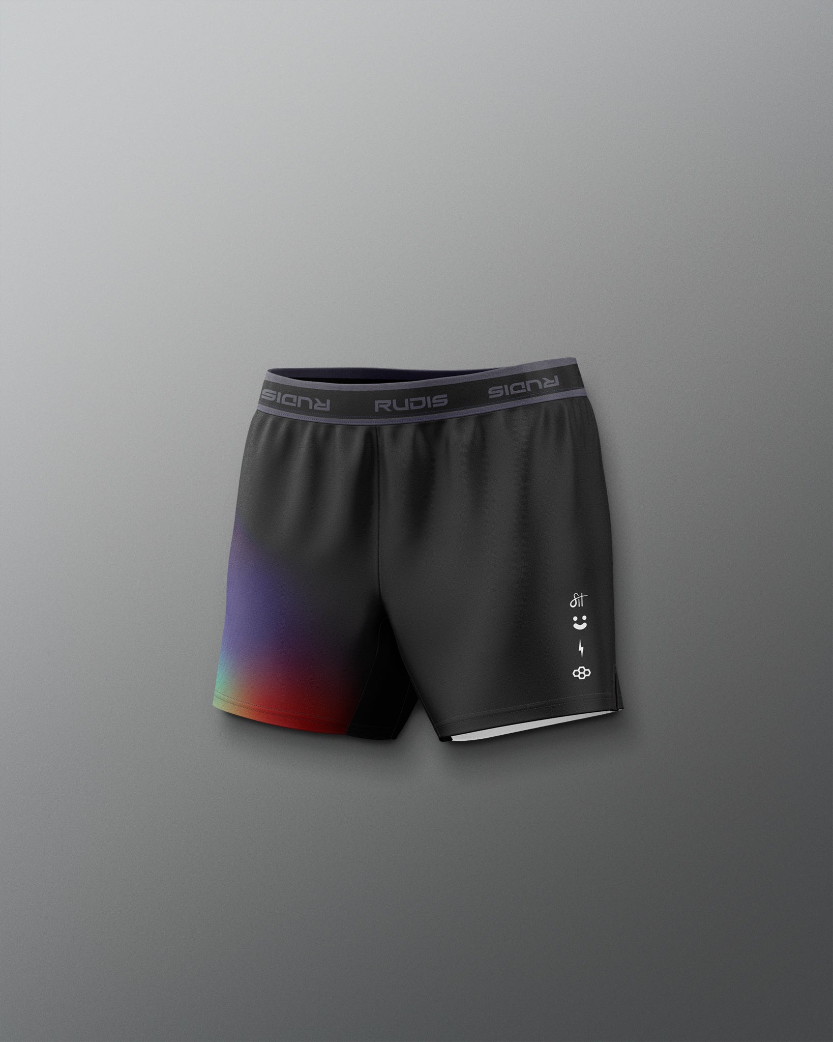 Black athletic shorts with colorful design on a gray background