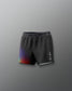 Black athletic shorts with colorful design on a gray background