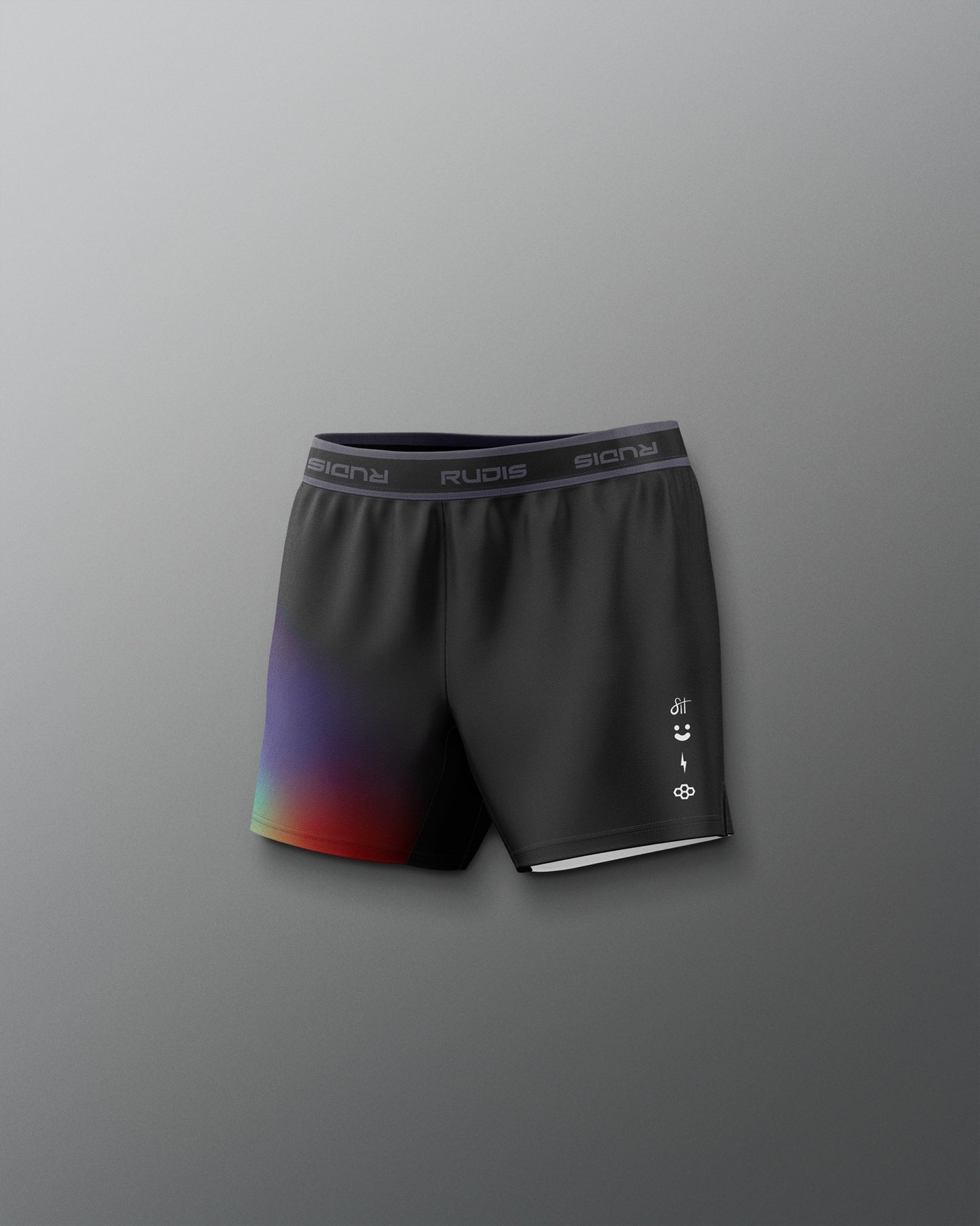 Black athletic shorts with colorful design on a gray background