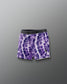 Purple tie-dye shorts with a brand logo on a gray background