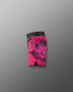 Pink and black patterned shorts on a gray background