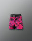 Pink and black patterned shorts on a gray background