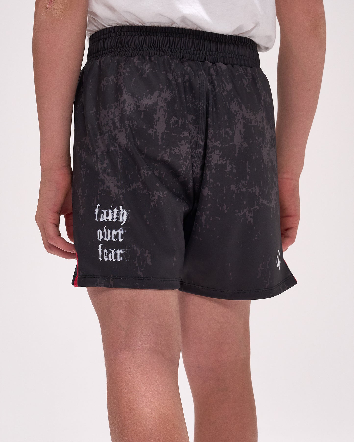 Black shorts with 'faith over fear' text on a white background
