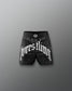 Black wrestling shorts with 'wrestling' text on a gray background