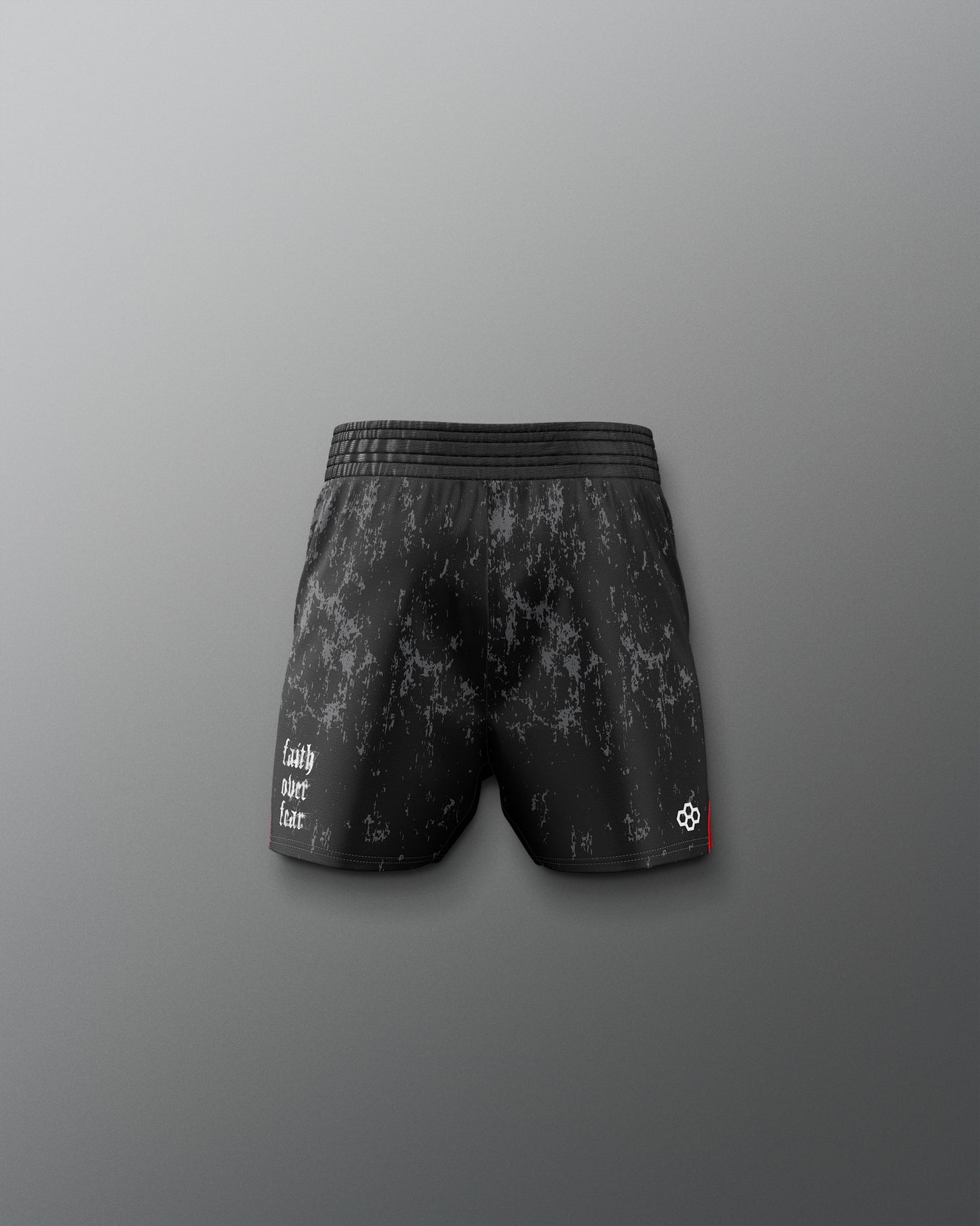 Black patterned shorts on a gray background