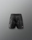 Black patterned shorts on a gray background