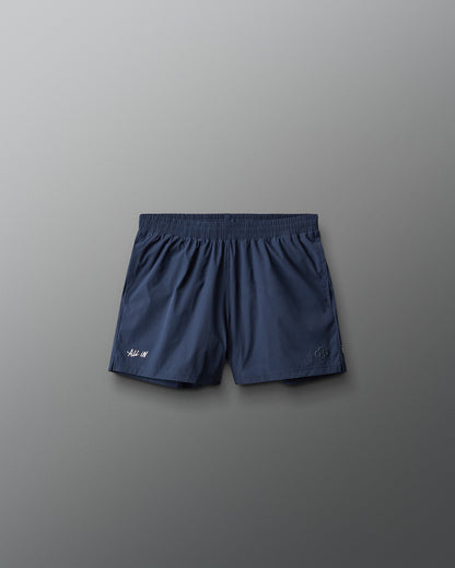 Navy blue shorts on a gray background