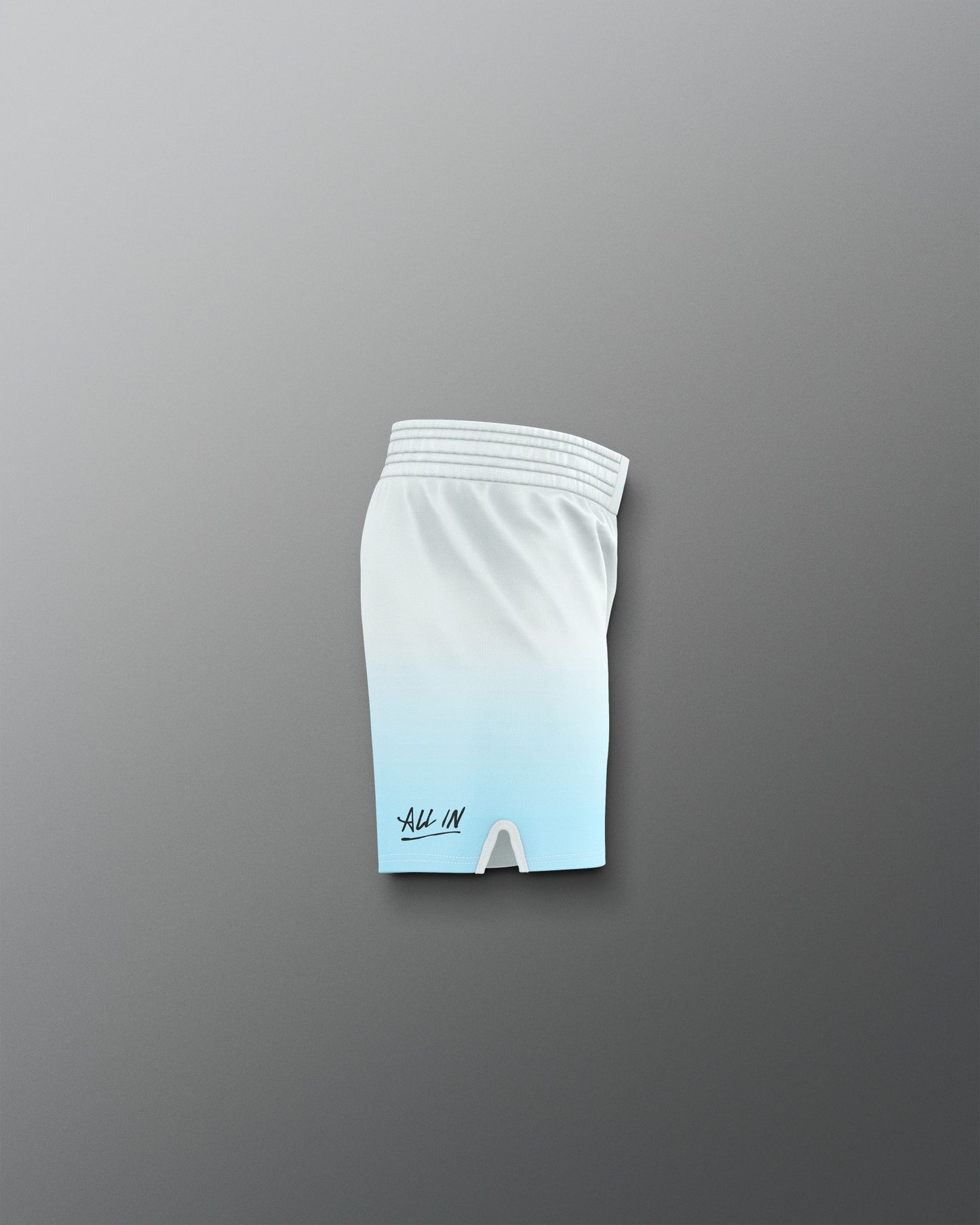 White athletic shorts with a logo on a gray background