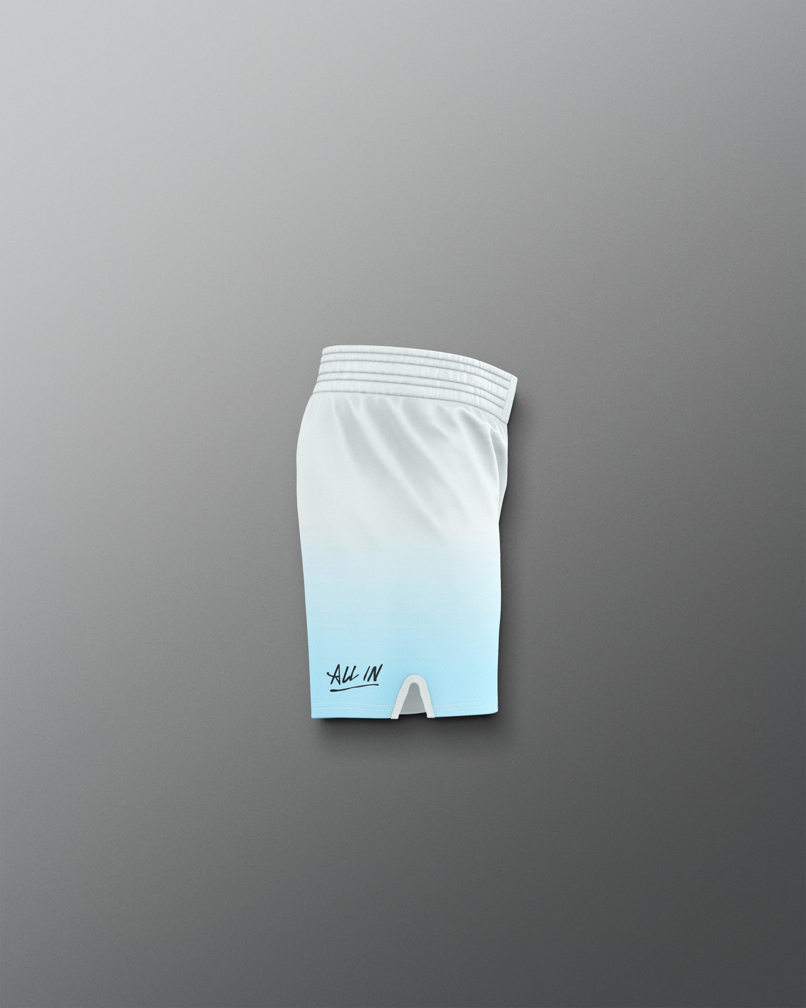 White athletic shorts with a logo on a gray background