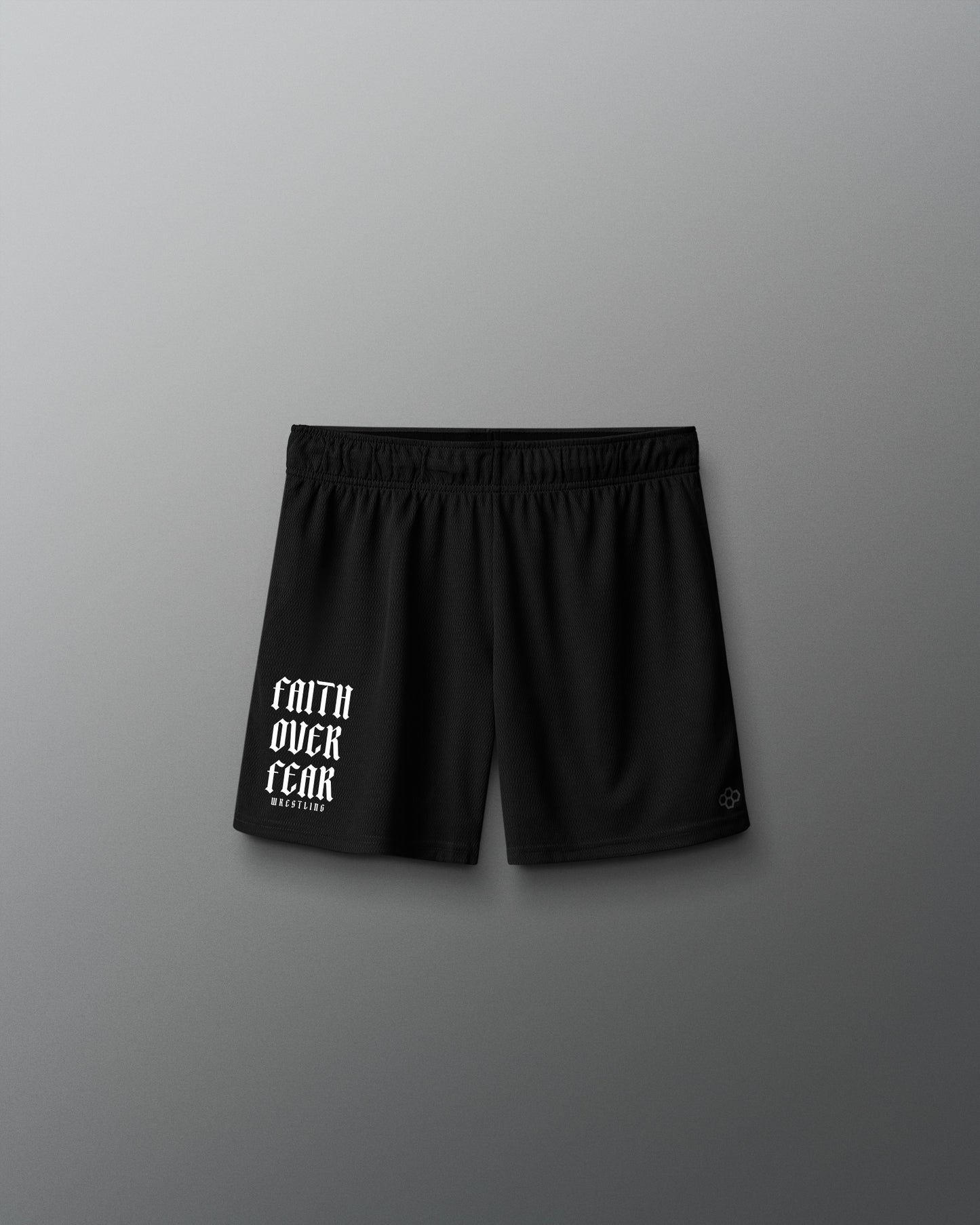 Black shorts with 'Faith Over Fear' text on a gray background