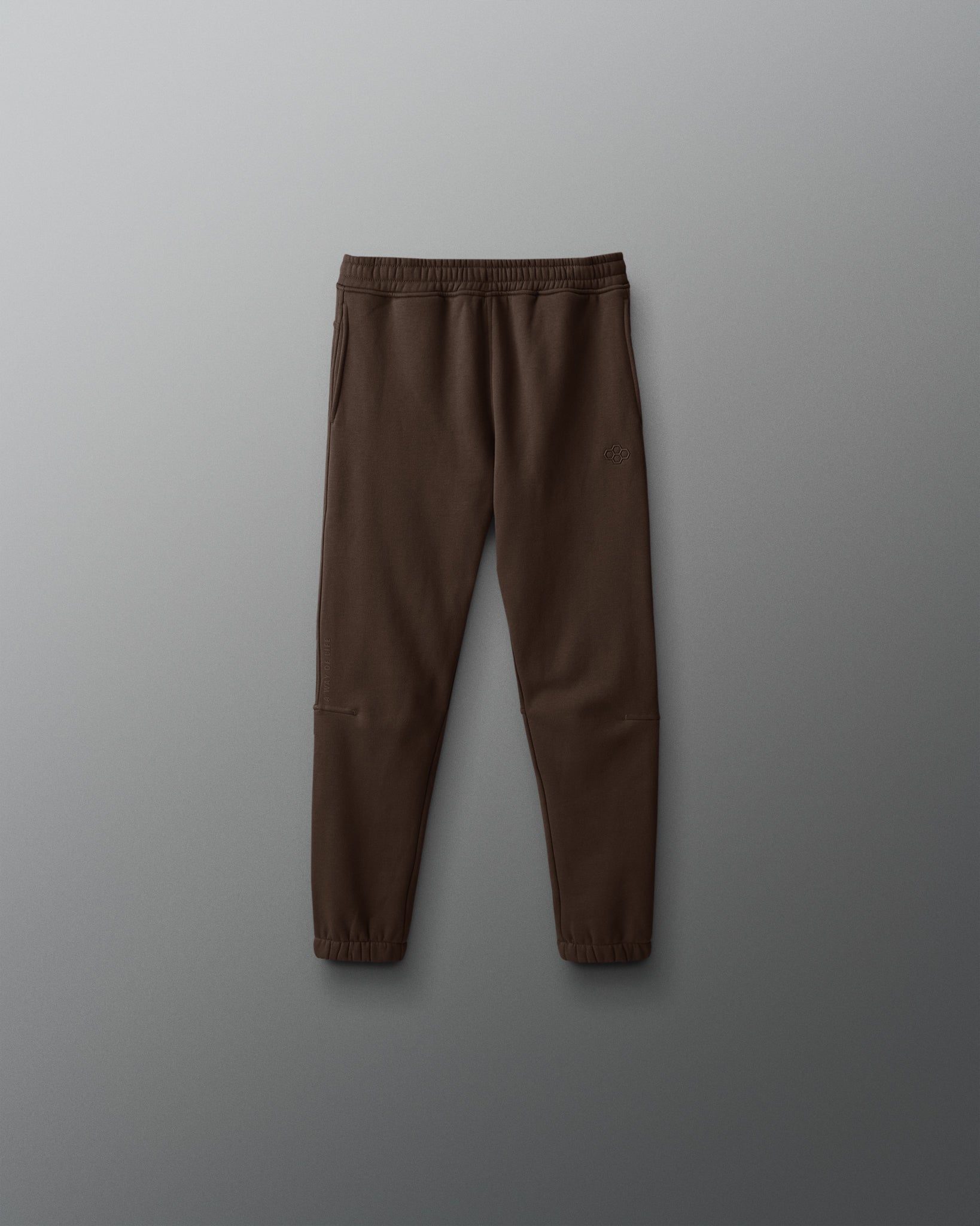 Brown pants on a gray background