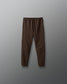 Brown pants on a gray background