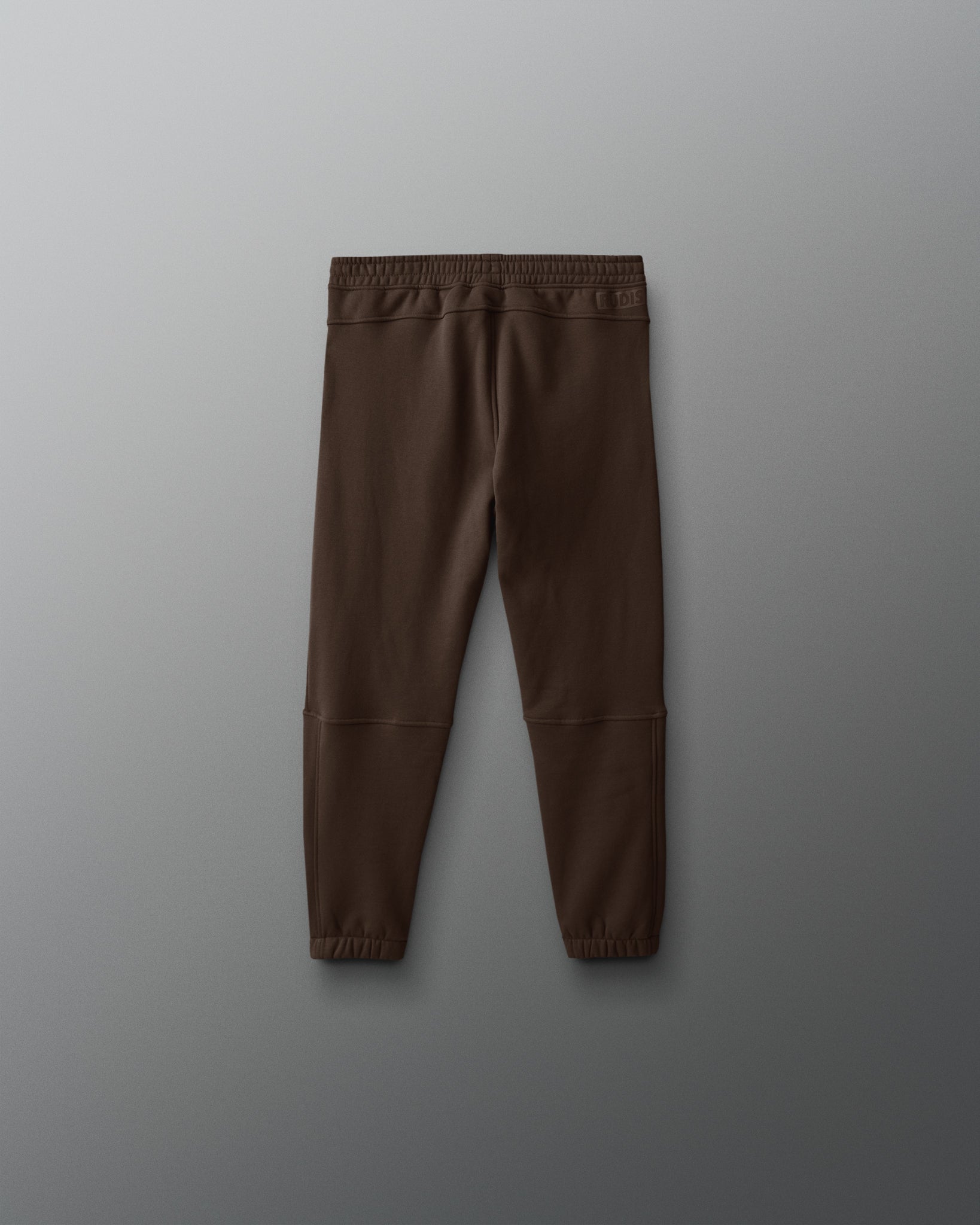 Brown pants on a gray background