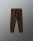 Brown pants on a gray background