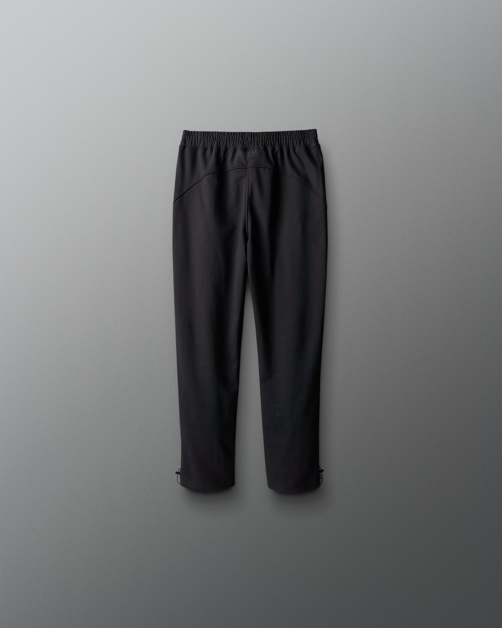 Black pants on a gray background