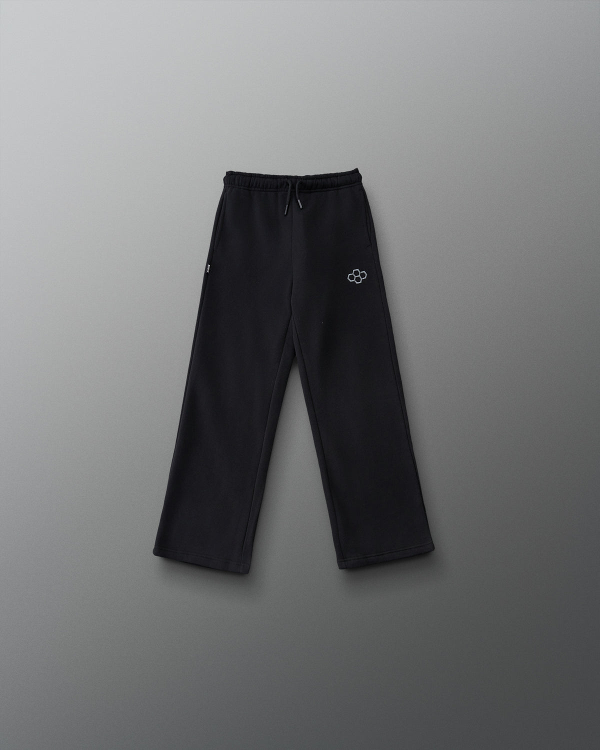 RUDIS Youth Comfort Fleece Wide Leg Sweatpant in Black, front view featuring a relaxed wide-leg fit, adjustable drawstring waistband, side pockets, and gray RUDIS logo. Copy Alt Text