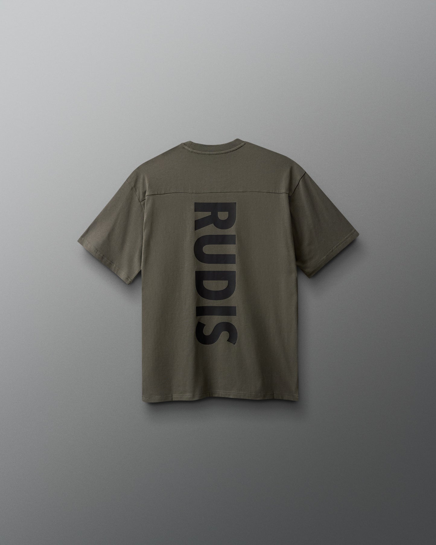 Green shirt with 'RUDIS' branding on the back against a gray background