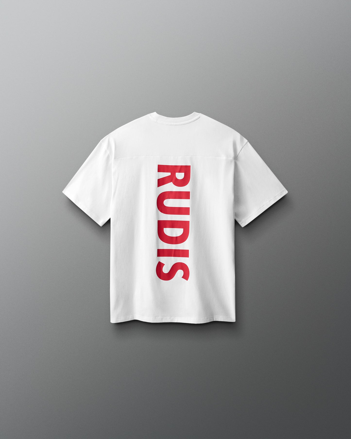 White t-shirt with 'RUDIS' printed on the back against a gray background