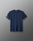 Navy blue t-shirt on a gray background
