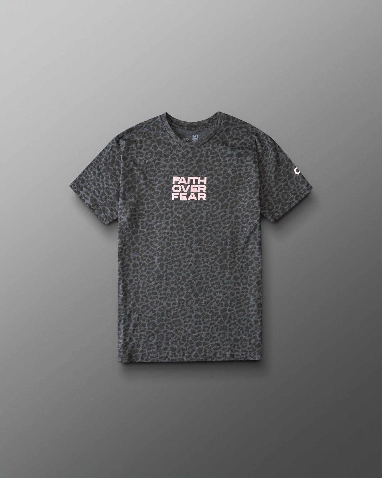 Gray t-shirt with leopard print pattern and 'Faith Over Fear' text on a gray background