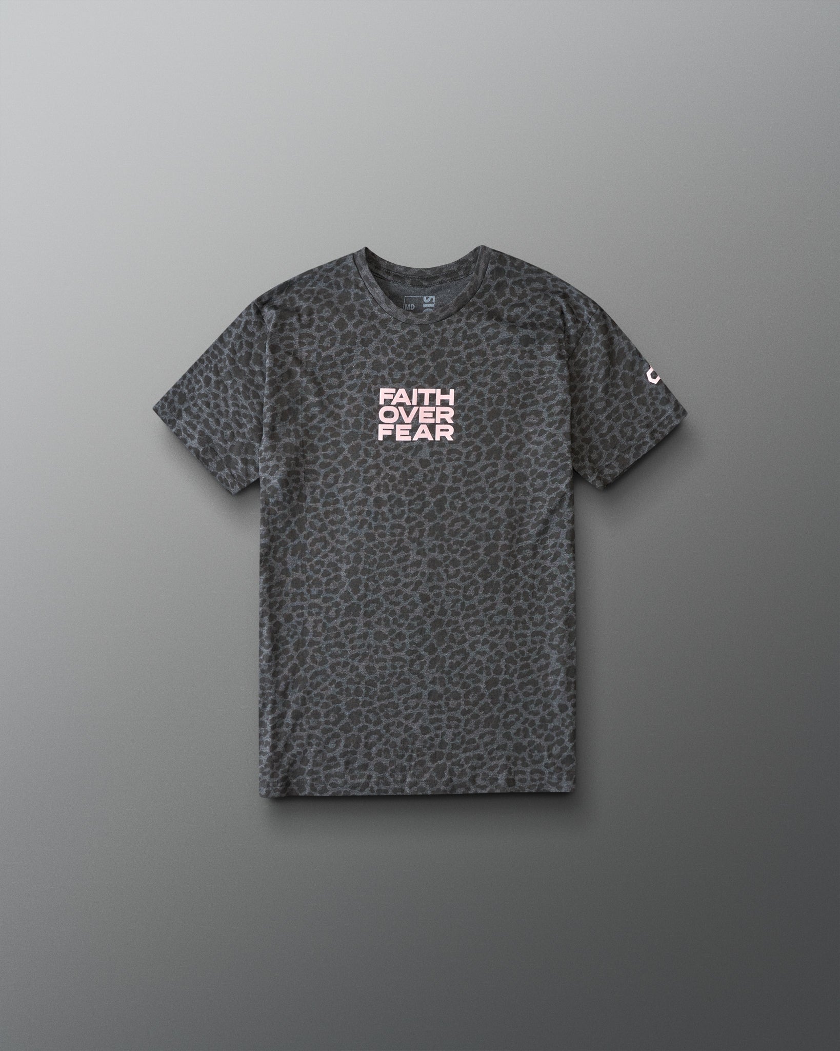 Gray t-shirt with leopard print pattern and 'Faith Over Fear' text on a gray background