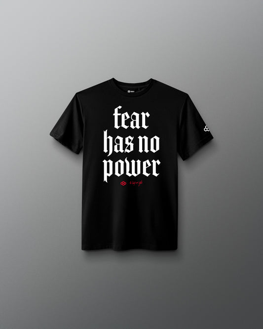 Black t-shirt with 'fear has no power' text on a gray background