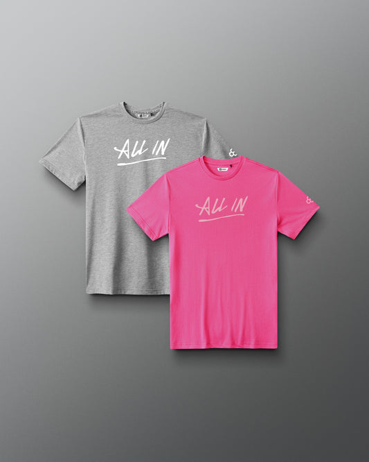 Front view of the RUDIS Motto Scripted Youth Elite Super Soft T-Shirt 2-Pack in pink and heather gray with “All In” chest graphics.