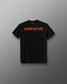 A black short-sleeve t-shirt with the phrase 'A WAY OF LIFE' printed across the chest in bright orange. The shirt is displayed flat against a dark gray gradient background.