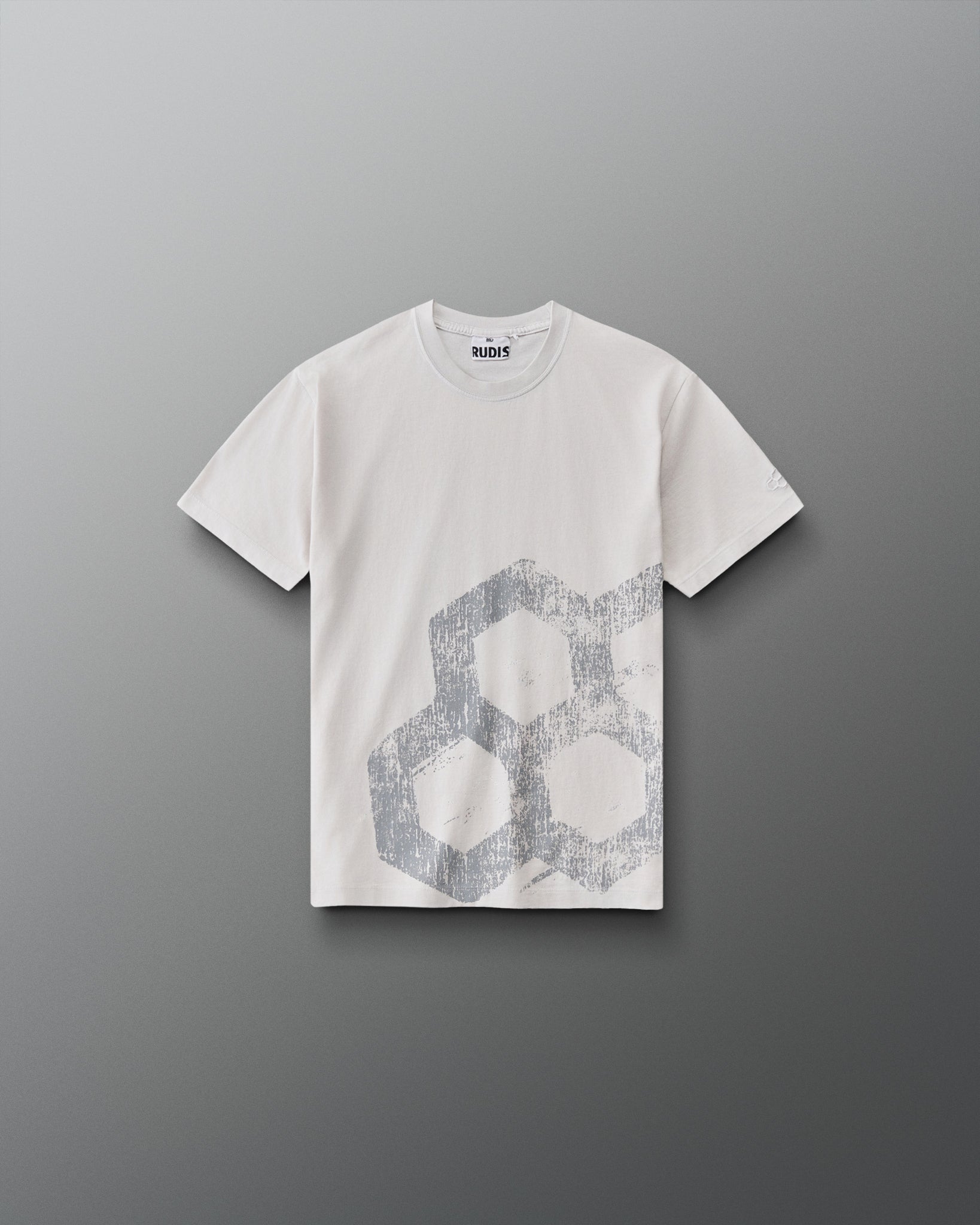 RUDIS Tilted Hex Youth Classic Cotton T-Shirt in Washed Lunar, front view featuring a distressed gray hexagon graphic on an off-white crewneck tee.