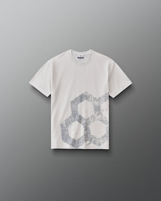 RUDIS Tilted Hex Youth Classic Cotton T-Shirt in Washed Lunar, front view featuring a distressed gray hexagon graphic on an off-white crewneck tee.