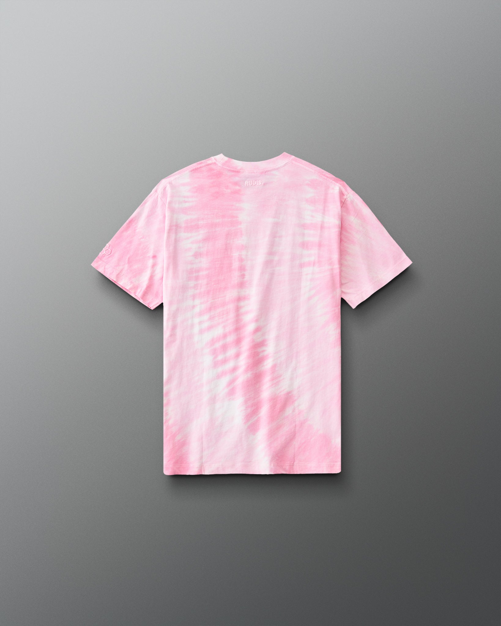 Back view of RUDIS Youth Script Wrestling Classic Cotton T-Shirt in pink and white tie-dye with subtle RUDIS branding below the collar.